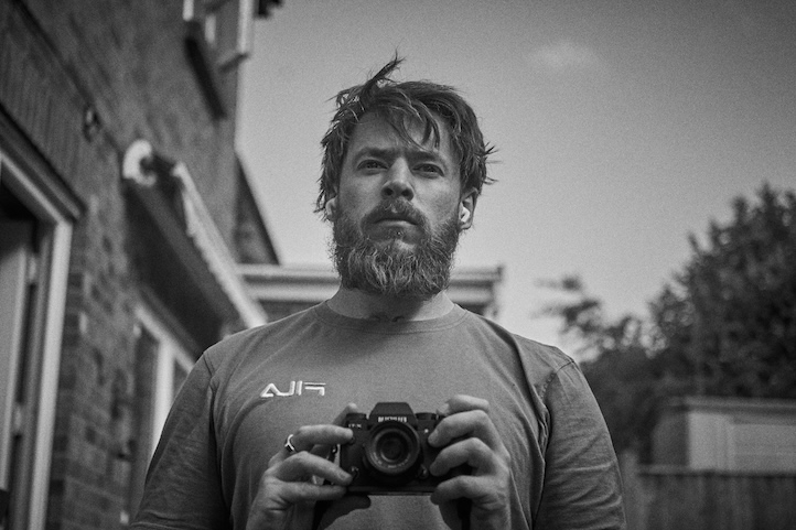 A photo of Adam Hutchinson